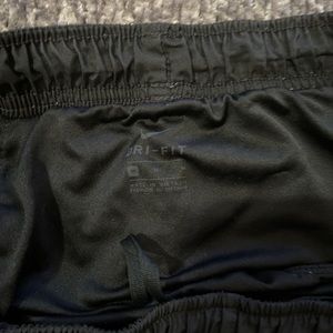 Plain black Nike shorts